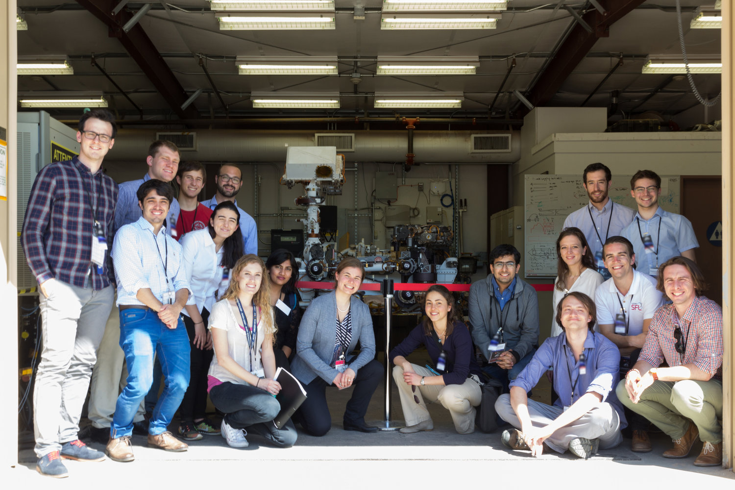 Team Explorer in front of the Curiosity Rover