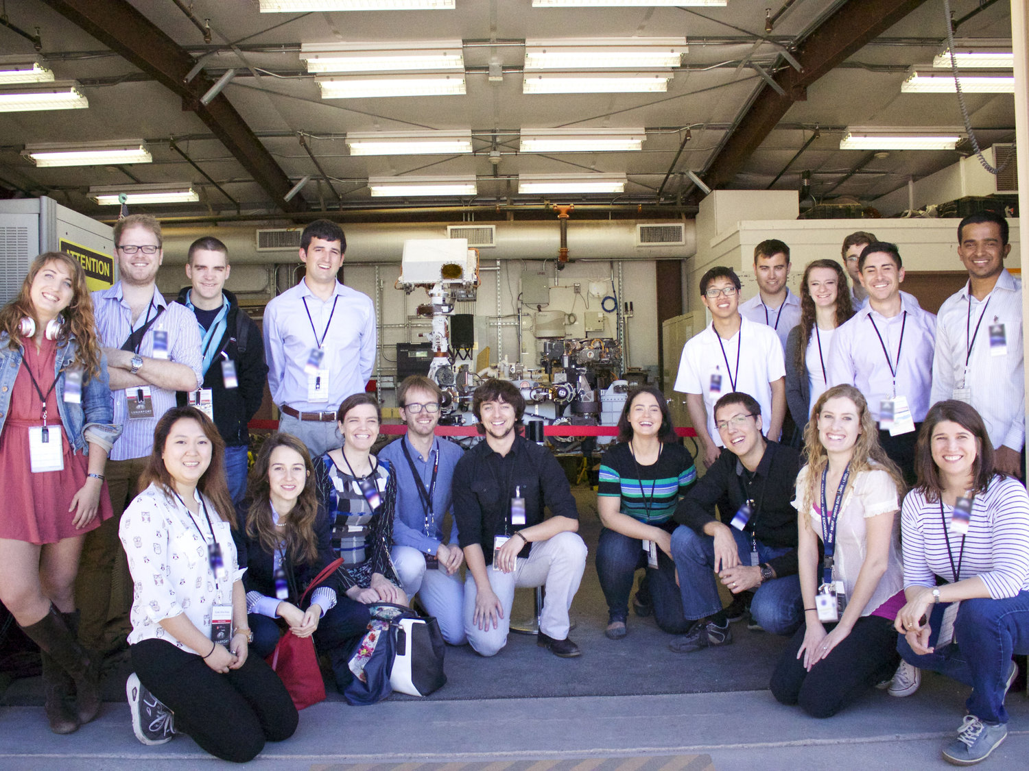 Team Voyager in front of the Curiosity Rover